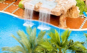 Swimming pool with cascade
